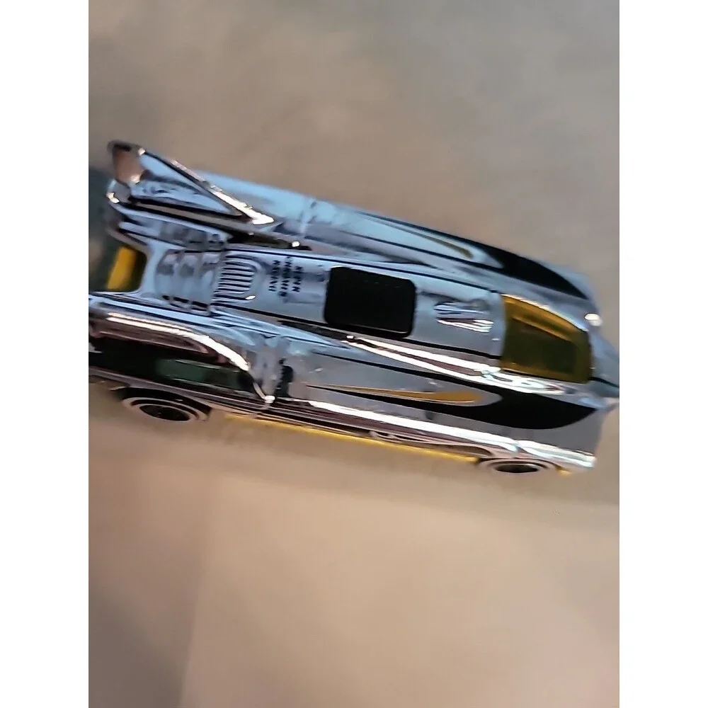 2014 Hot Wheels Silver Chrome Yellow Race Car 1:64 Vetuskey #17